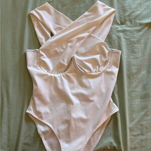 AKIRA White Cross Front Bodysuit